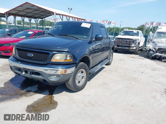 2001 Ford F-150 XLT with VIN 1FTRW08L71KC63676, listed as a IAAI auction lot 42536000 with 326,699 mi miles and . Bid and sale history available at DreamBid. Image 2.