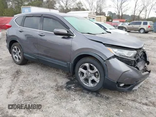 2019 Honda CR-V EX with VIN 7FARW1H57KE037678, listed as a IAAI auction lot 41790923 with 61,754 mi miles and . Bid and sale history available at DreamBid. Image 1.