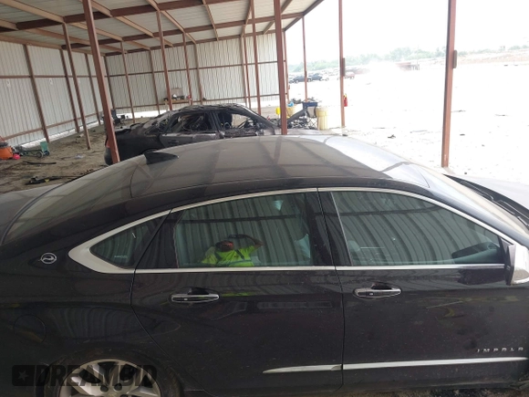 2018 Chevrolet Impala Premier with VIN 2G1125S3XJ9164052, listed as a IAAI auction lot 42232908 with 100,025 mi miles and . Bid and sale history available at DreamBid. Image 13.
