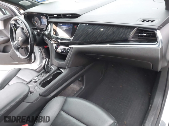 2021 Cadillac XT6 Premium Luxury z VIN 1GYKPCRSXMZ169206, wystawiony jako IAAI lot #41581841 z przebiegiem 64 789 mil mil oraz . Historia ofert i sprzedaży dostępna na DreamBid. Obrazek 5.