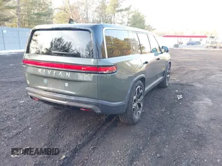 2022 Rivian R1S Launch Edition with VIN 7PDSGABL4NN000409, listed as a IAAI auction lot 41433164 with 39,603 mi miles. Bid and sale history available at carsss.com. Image 4.