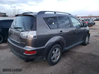 2011 Mitsubishi Outlander LS with VIN JA4JT3AXXBU610616, listed as a Copart auction lot 82882744 with 309,979 mi miles and Clean Title. Bid and sale history available at carsss.com. Image 3.
