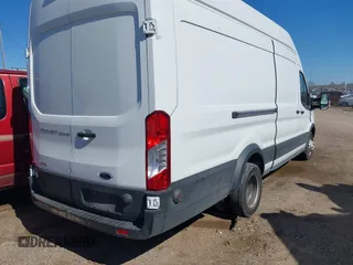 2019 Ford Transit Cargo with VIN 1FTBF4XG4KKB77790, listed as a IAAI auction lot 41711746 with 198,739 mi miles. Bid and sale history available at carsss.com. Image 4.