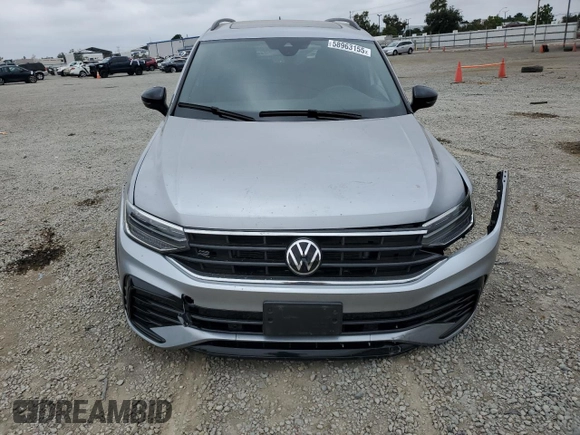 2023 Volkswagen Tiguan SE R-Line Black с VIN 3VVCB7AX4PM038156, выставлен на аукционе Copart как лот 58963155 с пробегом 24 871 миль миль и Списание • Salvage title. История ставок и продаж доступна на DreamBid. Изображение 5.