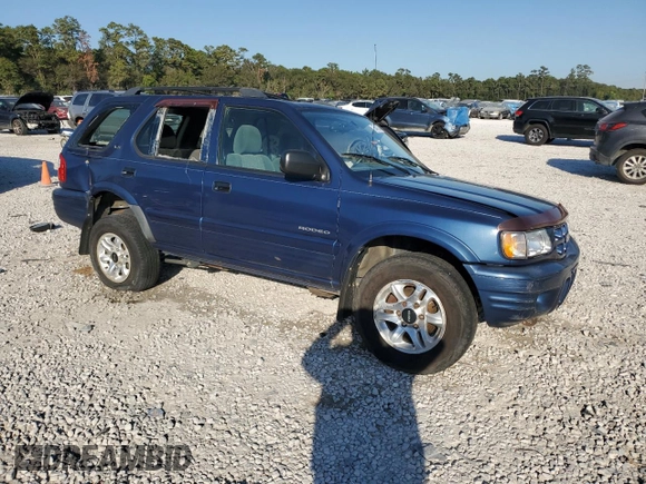 2002 Isuzu Rodeo S with VIN 4S2CK58W124307433, listed as a Copart auction lot 75447074 with 129,163 mi miles and Salvage title. Bid and sale history available at DreamBid. Image 4.