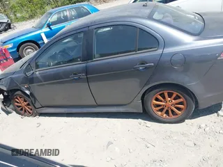 2011 Mitsubishi Lancer ES z VIN JA32U2FU0BU031133, wystawiony jako IAAI lot #42046429 z przebiegiem 279 551 mil mil oraz . Historia ofert i sprzedaży dostępna na DreamBid. Obrazek 14.