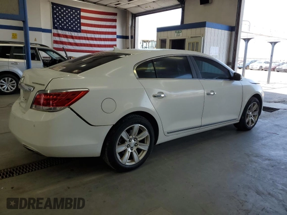 2013 Buick LaCrosse Leather с VIN 1G4GC5E39DF120383, выставлен на аукционе Copart как лот 60920775 с пробегом 124 044 миль миль и Списание • Salvage title. История ставок и продаж доступна на DreamBid. Изображение 3.
