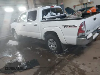 2013 Toyota Tacoma with VIN 3TMLU4EN2DM104490, listed as a IAAI auction lot 41636616 with 153,036 mi miles and . Bid and sale history available at DreamBid. Image 3.