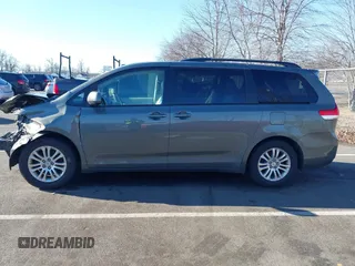 2011 Toyota Sienna XLE AAS with VIN 5TDYK3DC4BS072693, listed as a IAAI auction lot 41579262 with 146,201 mi miles. Bid and sale history available at carsss.com. Image 14.