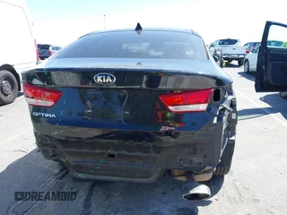 2019 Kia Optima LX with VIN 5XXGT4L34KG308177, listed as a IAAI auction lot 41919565 with 57,815 mi miles. Bid and sale history available at carsss.com. Image 17.