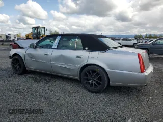 2006 Cadillac DTS 1SC z VIN 1G6KD57Y16U227899, wystawiony jako Copart lot #51848255 z przebiegiem Nie podano mil oraz Szkoda całkowita • Salvage title. Historia ofert i sprzedaży dostępna na DreamBid. Obrazek 2.