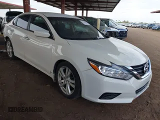2016 Nissan Altima S z VIN 1N4AL3AP8GN380944, wystawiony jako IAAI lot #42375094 z przebiegiem 142 513 mil mil oraz . Historia ofert i sprzedaży dostępna na DreamBid. Obrazek 1.