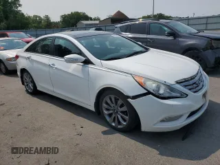 2012 Hyundai Sonata Limited z VIN 5NPEC4AB2CH490212, wystawiony jako Copart lot #59576655 z przebiegiem 144 183 mil mil oraz Szkoda całkowita • Salvage title. Historia ofert i sprzedaży dostępna na DreamBid. Obrazek 4.