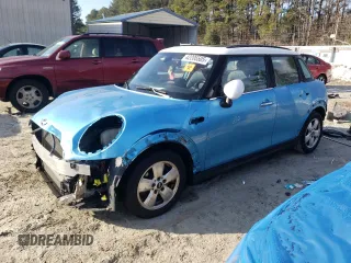 2017 MINI Hardtop 4 Door Cooper with VIN WMWXU1C57H2E18443, listed as a Copart auction lot 42206505 with 91,310 mi miles and Salvage Title. Bid and sale history available at DreamBid. Image 1.