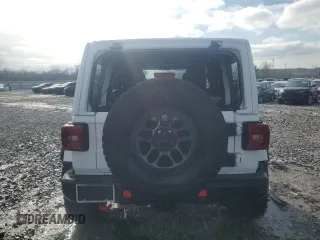 2021 Jeep Wrangler Unlimited Rubicon with VIN 1C4JJXFG1MW849460, listed as a Copart auction lot 45307515 with 54,517 mi miles and Salvage title. Bid and sale history available at DreamBid. Image 6.