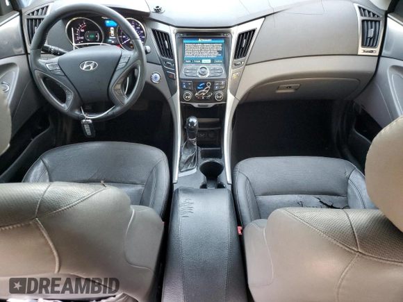 2012 Hyundai Sonata Hybrid with VIN KMHEC4A44CA024902, listed as a Copart auction lot 51710515 with 206,453 mi miles and Salvage Title. Bid and sale history available at DreamBid. Image 8.