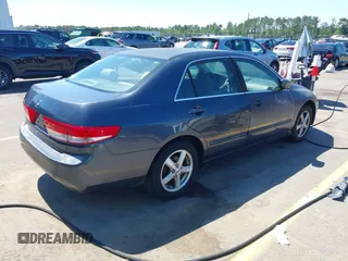 2003 Honda Accord EX z VIN 1HGCM56633A066438, wystawiony jako IAAI lot #42279849 z przebiegiem 266 239 mil mil oraz . Historia ofert i sprzedaży dostępna na DreamBid. Obrazek 4.