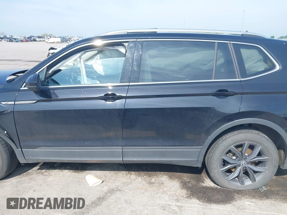 2022 Volkswagen Tiguan SE with VIN 3VV2B7AX0NM146315, listed as a IAAI auction lot 42512975 with 40,577 mi miles and . Bid and sale history available at DreamBid. Image 14.