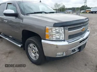 2013 Chevrolet Silverado 1500 LT with VIN 3GCPKSE74DG332907, listed as a IAAI auction lot 41951755 with 214,211 mi miles. Bid and sale history available at carsss.com. Image 6.