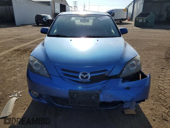 2006 Mazda 3 S Grand Touring with VIN JM1BK343861434940, listed as a Copart auction lot 63624024 with 56,737 mi miles and Salvage Title. Bid and sale history available at DreamBid. Image 5.