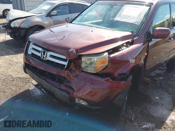 2007 Honda Pilot EX-L with VIN 5FNYF18547B006094, listed as a IAAI auction lot 42297719 with 235,632 mi miles and . Bid and sale history available at DreamBid. Image 6.