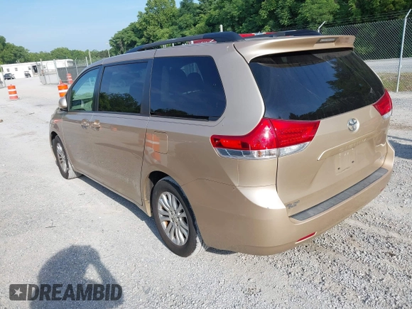 2011 Toyota Sienna XLE AAS with VIN 5TDYK3DC7BS008535, listed as a IAAI auction lot 42589645 with 208,624 mi miles and . Bid and sale history available at DreamBid. Image 3.