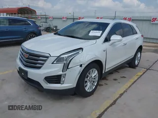 2017 Cadillac XT5 FWD with VIN 1GYKNARS3HZ225471, listed as a IAAI auction lot 42168166 with 149,685 mi miles and . Bid and sale history available at DreamBid. Image 2.