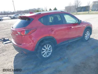 2016 Mazda CX-5 Touring with VIN JM3KE4CY5G0816285, listed as a IAAI auction lot 41888537 with 101,598 mi miles. Bid and sale history available at carsss.com. Image 4.
