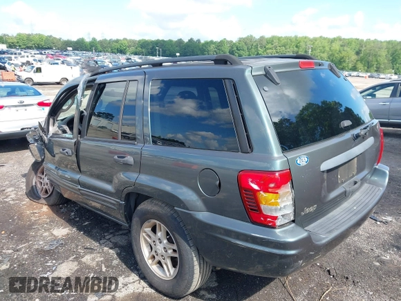 2004 Jeep Grand Cherokee Laredo with VIN 1J4GX48S34C192181, listed as a IAAI auction lot 42320368 with 181,415 mi miles and . Bid and sale history available at DreamBid. Image 3.
