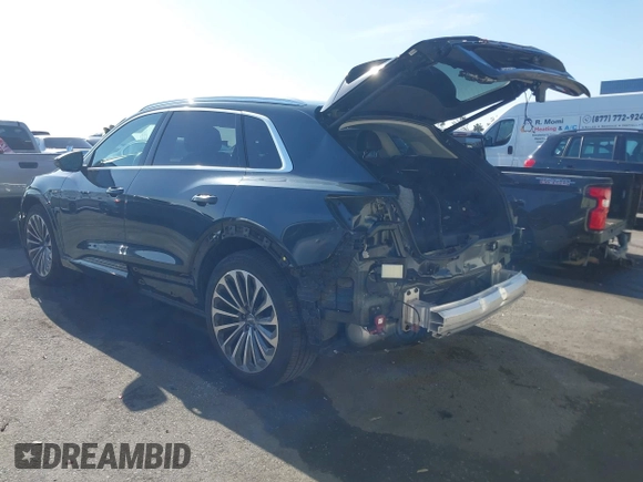 2019 Audi e-tron Prestige with VIN WA1VAAGE2KB021539, listed as a IAAI auction lot 42007353 with 14,238 mi miles and . Bid and sale history available at DreamBid. Image 3.