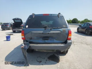 2002 Jeep Grand Cherokee Laredo with VIN 1J4GW48S92C319161, listed as a Copart auction lot 59304035 with 257,907 mi miles and Salvage title. Bid and sale history available at DreamBid. Image 6.