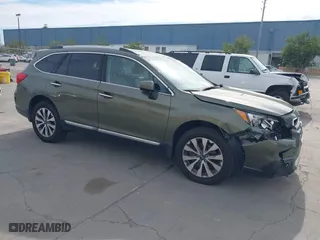 2017 Subaru Outback Touring with VIN 4S4BSETCXH3371887, listed as a IAAI auction lot 41692515 with 57,039 mi miles. Bid and sale history available at carsss.com. Image 1.