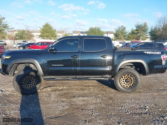 2022 Toyota Tacoma 4WD SR with VIN 3TMCZ5AN1NM479690, listed as a IAAI auction lot 41090208 with 26,481 mi miles. Bid and sale history available at carsss.com. Image 14.