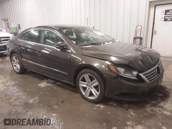 2015 Volkswagen CC R-Line z VIN WVWBP7AN0FE829797, wystawiony jako IAAI lot #41296150 z przebiegiem 138 608 mil mil oraz . Historia ofert i sprzedaży dostępna na DreamBid. Obrazek 1.