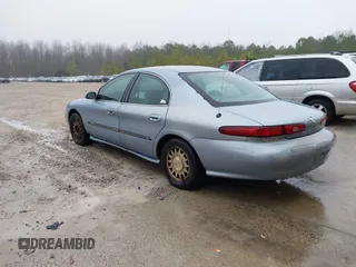1997 Mercury Sable LS z VIN 1MELM53S0VG648365, wystawiony jako IAAI lot #41501814 z przebiegiem 256 352 mil mil oraz . Historia ofert i sprzedaży dostępna na DreamBid. Obrazek 3.