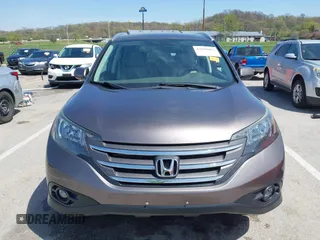 2014 Honda CR-V EX-L with VIN 5J6RM4H70EL096555, listed as a IAAI auction lot 42038062 with 113,601 mi miles. Bid and sale history available at carsss.com. Image 12.