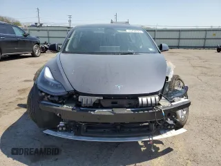 2023 Tesla Model 3 Long Range with VIN 5YJ3E1EB2PF389041, listed as a Copart auction lot 53450725 with 27,060 mi miles and Salvage Title. Bid and sale history available at DreamBid. Image 5.