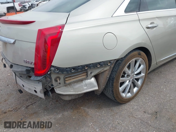 2013 Cadillac XTS Luxury with VIN 2G61P5S30D9132193, listed as a IAAI auction lot 41897709 with 140,780 mi miles and . Bid and sale history available at DreamBid. Image 18.