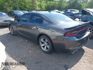 2018 Dodge Charger SXT Plus with VIN 2C3CDXHG9JH176400, listed as a IAAI auction lot 42128281 with 198,766 mi miles and . Bid and sale history available at carsss.com. Image 3.