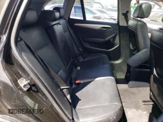 2014 BMW X1 xDrive28i z VIN WBAVL1C5XEVY16263, wystawiony jako Copart lot #52242225 z przebiegiem 154 951 mil mil oraz Szkoda całkowita • Salvage title. Historia ofert i sprzedaży dostępna na DreamBid. Obrazek 11.