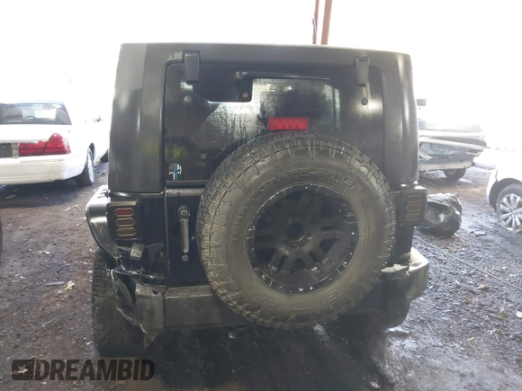 2008 Jeep Wrangler Unlimited Rubicon with VIN 1J8GA69108L562705, listed as a IAAI auction lot 41306923 with 150,002 mi miles and . Bid and sale history available at DreamBid. Image 16.