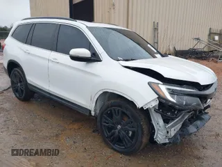 2021 Honda Pilot Special Edition with VIN 5FNYF5H25MB028579, listed as a IAAI auction lot 41559701 with 63,936 mi miles and . Bid and sale history available at carsss.com. Image 1.