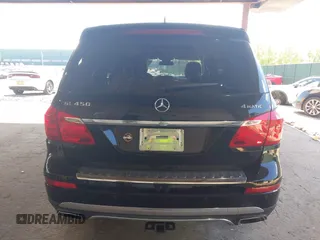 2014 Mercedes-Benz GL 450 z VIN 4JGDF7CE7EA395551, wystawiony jako IAAI lot #42247332 z przebiegiem 105 636 mil mil oraz . Historia ofert i sprzedaży dostępna na DreamBid. Obrazek 17.