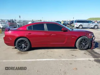 2014 Dodge Charger SXT with VIN 2C3CDXHG6EH219855, listed as a IAAI auction lot 41689205 with 86,092 mi miles and . Bid and sale history available at DreamBid. Image 14.