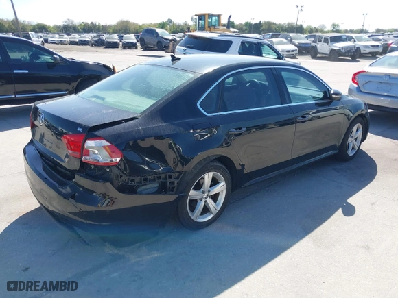 2012 Volkswagen Passat SE w/Sunroof with VIN 1VWBH7A38CC063186, listed as a IAAI auction lot 41700992 with 151,454 mi miles. Bid and sale history available at carsss.com. Image 4.