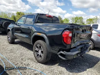 2023 GMC Canyon 4WD AT4 with VIN 1GTP6DEK9P1151776, listed as a Copart auction lot 52977805 with 11,750 mi miles and Salvage Title. Bid and sale history available at carsss.com. Image 2.