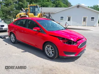 2015 Ford Focus SE with VIN 1FADP3F20FL318107, listed as a IAAI auction lot 42584851 with 99,673 mi miles and . Bid and sale history available at DreamBid. Image 1.