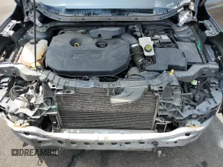 2015 Ford Escape Titanium with VIN 1FMCU9J98FUB49112, listed as a Copart auction lot 58989915 with 94,060 mi miles and Salvage title. Bid and sale history available at DreamBid. Image 11.