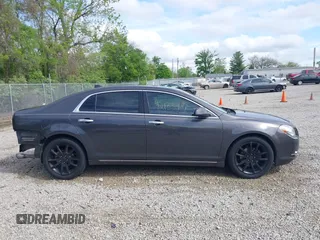 2012 Chevrolet Malibu LTZ with VIN 1G1ZG5E74CF297032, listed as a IAAI auction lot 42133482 with 82,682 mi miles and . Bid and sale history available at DreamBid. Image 14.