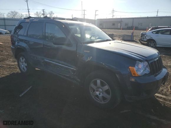 2010 Jeep Grand Cherokee Laredo with VIN 1J4PR4GK2AC125000, listed as a Copart auction lot 45710345 with 121,202 mi miles and Salvage Title. Bid and sale history available at carsss.com. Image 4.